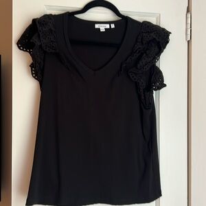 Nico’s black t shirt size large sleeveless with eyelet ruffles